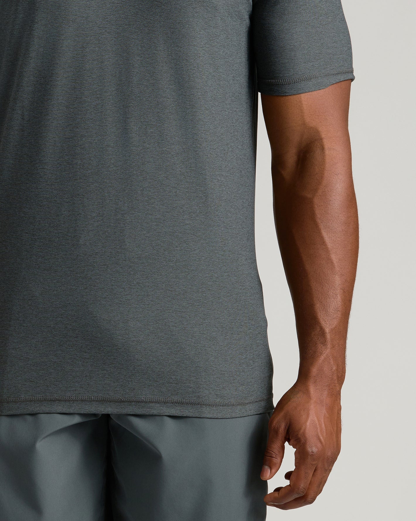 Tall Active V-Neck showcasing snug fit and relaxed arm.