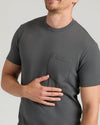 Staple Tall Heavyweight Pocket Crew worn by smiling person, highlighting chest pocket.