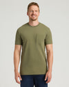 Military Green Tall Heavyweight Pocket Crew on smiling man in dark jeans.