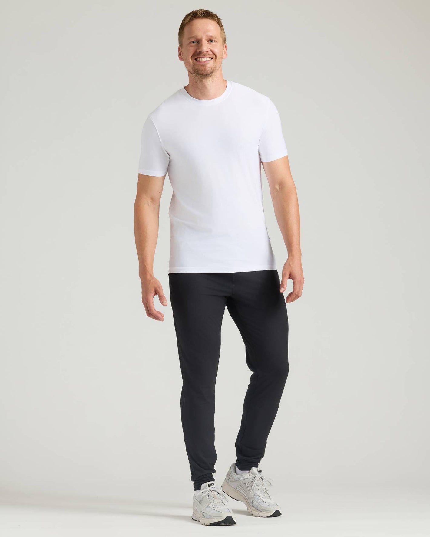 Tall Active Joggers 3-Pack modeled by man in relaxed pose.