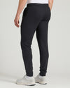 Black Tall Active Joggers with elastic waistband, side pockets, and chunky shoes.