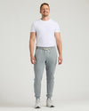 Man wearing Medium Heather Gray Tall Fleece French Terry Joggers.