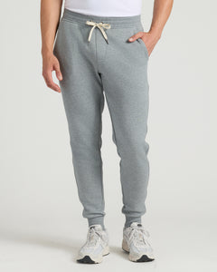True ClassicTall Fleece French Terry Joggers with cuffed ankles, white sneakers visible.