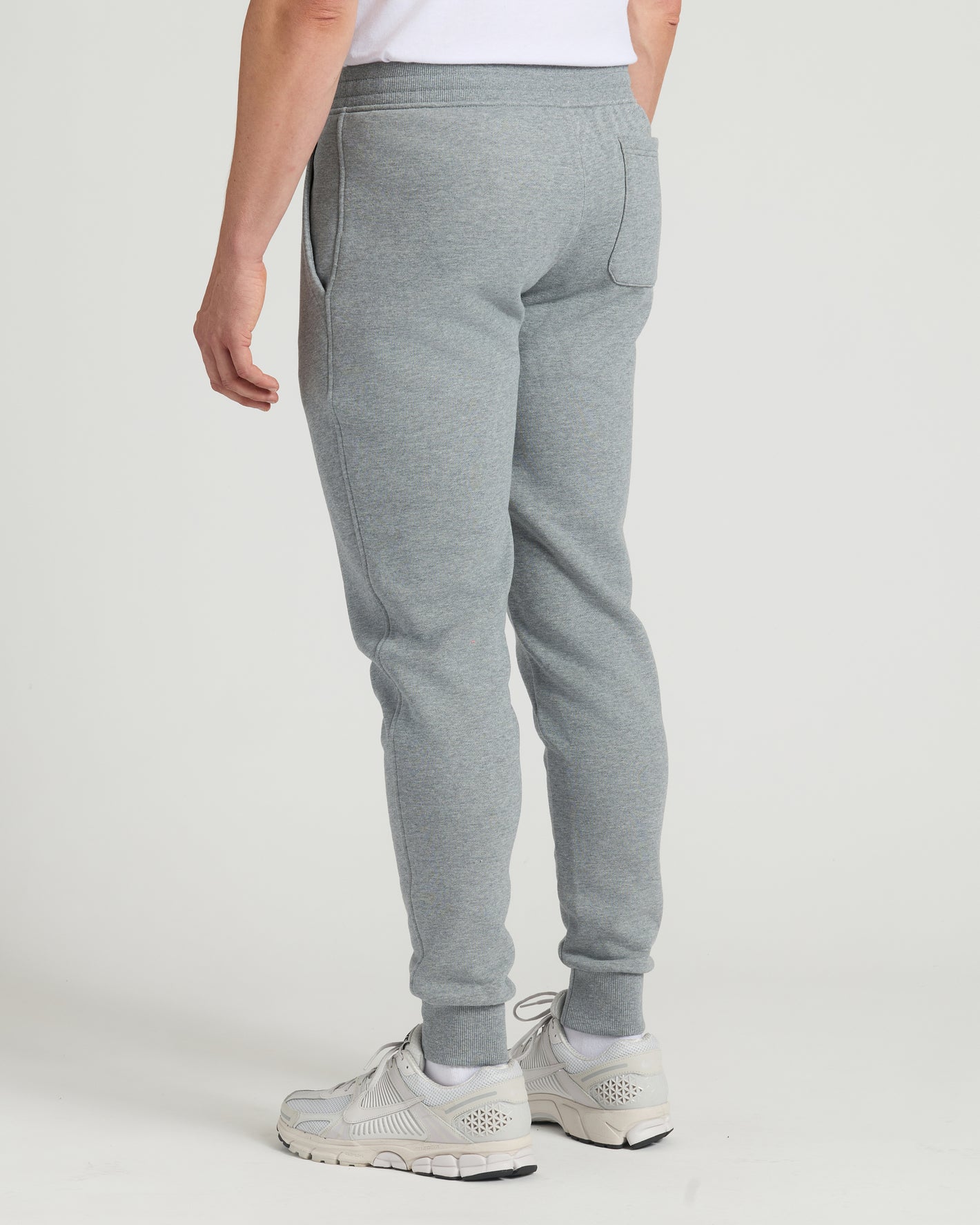 Medium Heather Gray Tall Fleece French Terry Joggers with off-white sneakers.