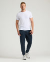 Tall male in Black & Navy Tall Fleece French Terry Joggers 2-Pack.