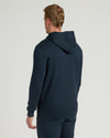 Man wearing Navy Tall Fleece Pullover Hoodie & Joggers 2-Pack.