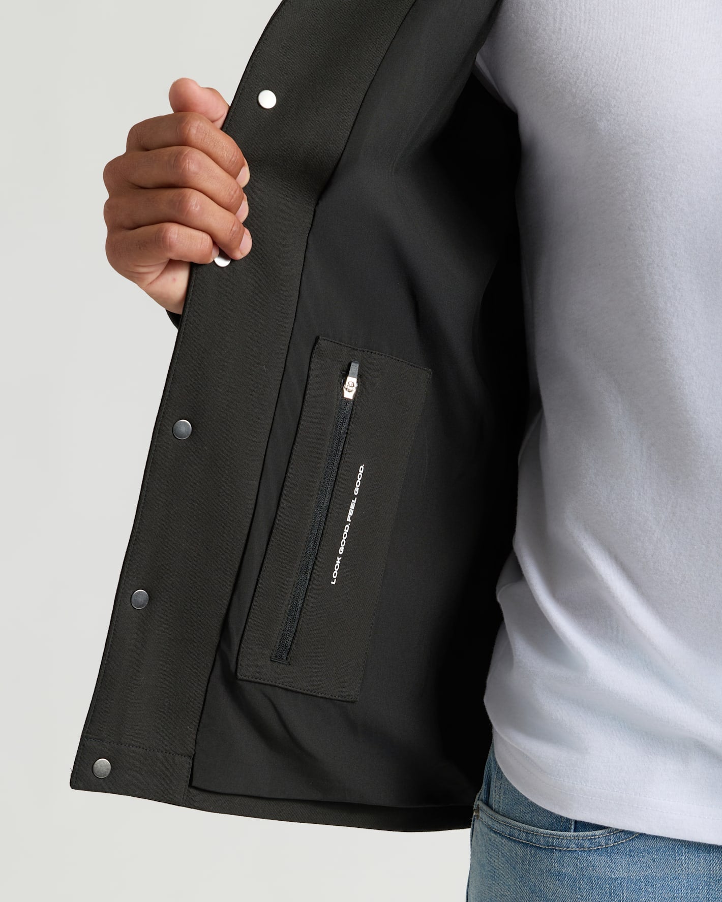 Black Casual Jacket with interior zip-pocket and silver snap buttons.