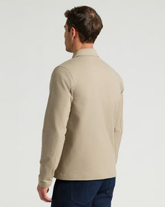 True ClassicBack view of man in Staple Casual Jacket 3-Pack, beige polo style.