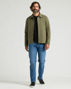 True ClassicMan wearing Military Green Casual Jacket with black tee and jeans.