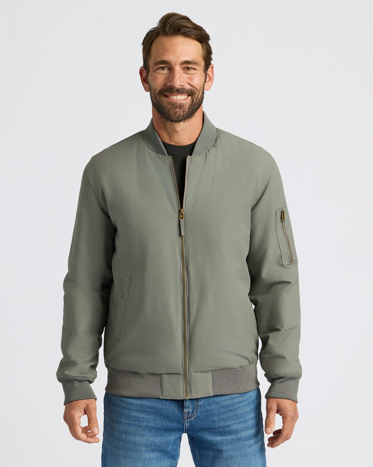 Carbon Bomber Jacket worn with jeans and a black T-shirt.