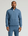 Man modeling Fiord Half Zip Fleece Sweatshirt with joggers.