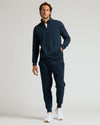 Male model in Navy Half Zip Fleece Sweatshirt & Jogger 2-Pack.