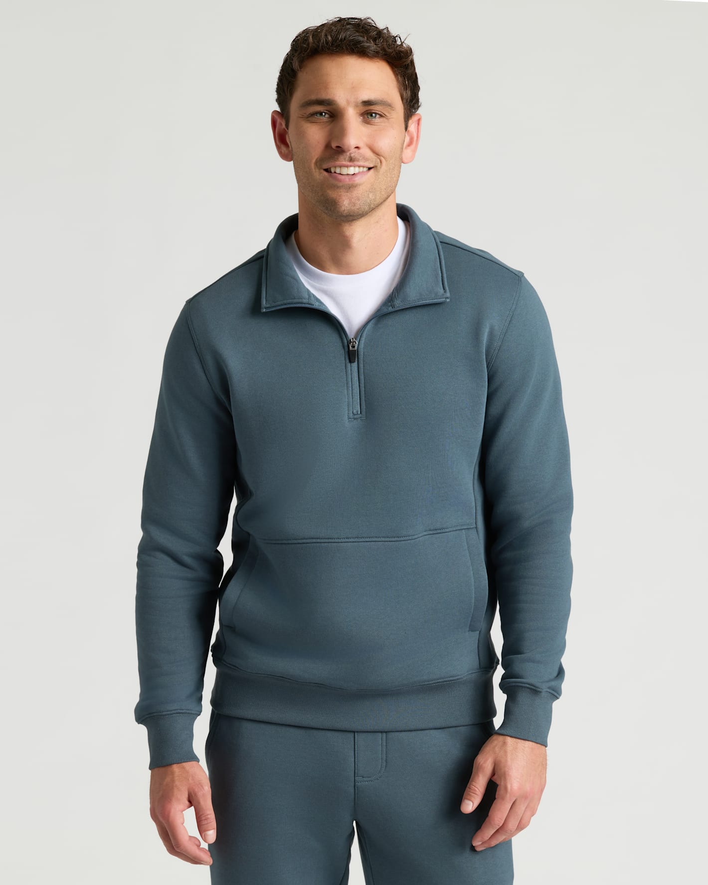 Neptune Half Zip Fleece Sweatshirt & Jogger 2-Pack worn by smiling man.