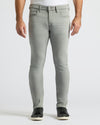 Medium Gray Wash Slim Comfort Stretch Jeans with black sneakers.
