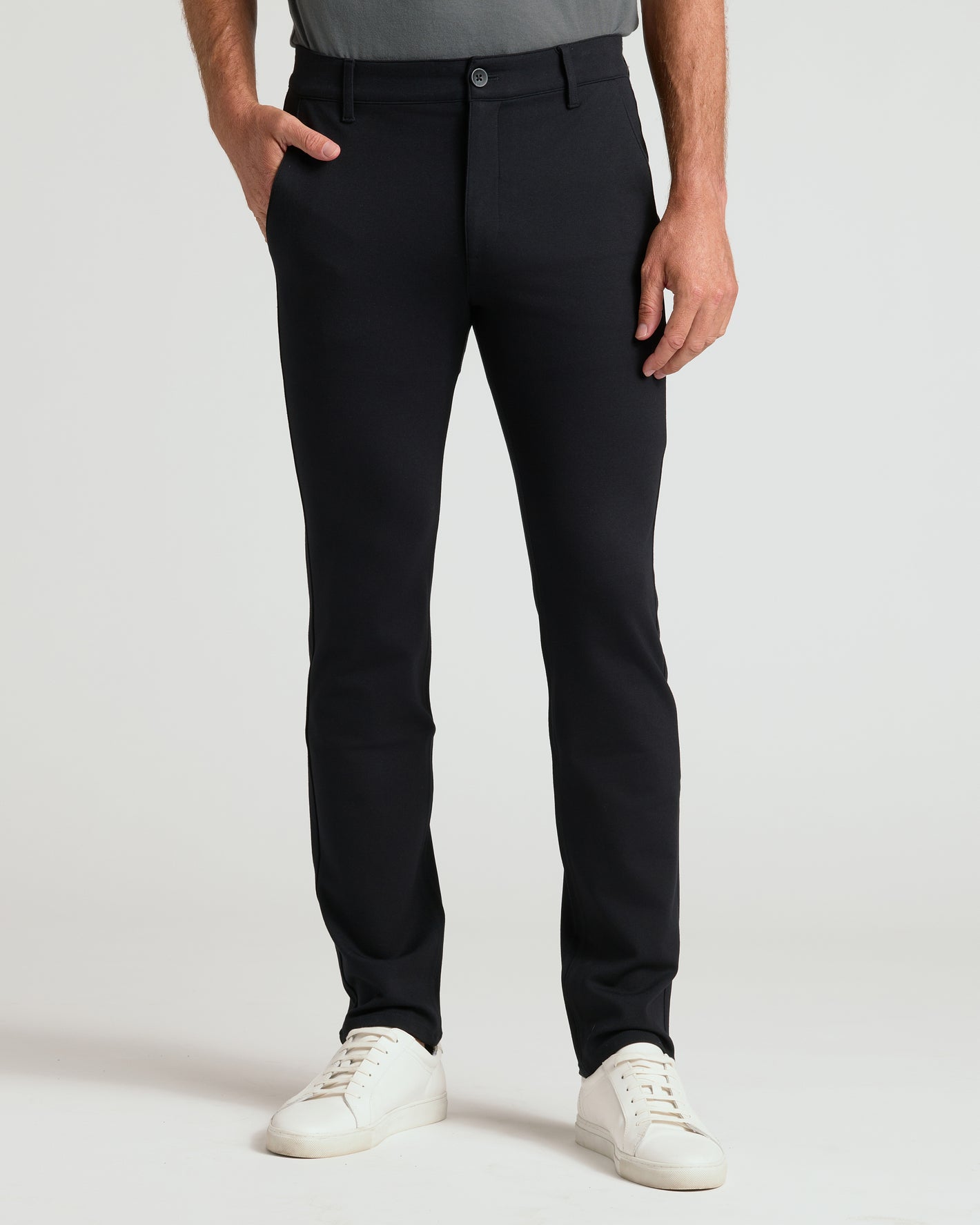 Neutral Slim Comfort Knit Chino Pant 3-Pack modeled with white sneakers.