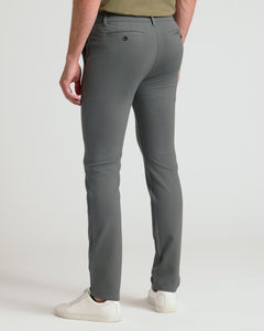 True ClassicCarbon & Khaki Slim Comfort Knit Chino 2-Pack trousers with sneakers.