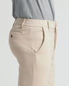 Sandstone Comfort Chino Pants side view, featuring pockets and belt loops.