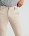 Wearing Sandstone Comfort Chino Pants, demonstrating waistband stretch.
