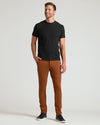 Man wearing Khaki Suede Brown Slim Comfort Knit Chino 2-Pack.