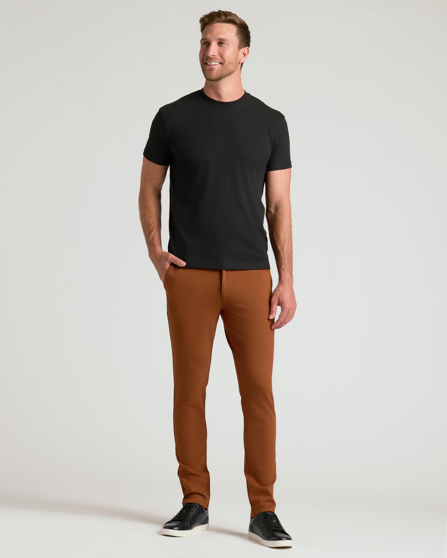 Man wearing Khaki Suede Brown Slim Comfort Knit Chino 2-Pack.
