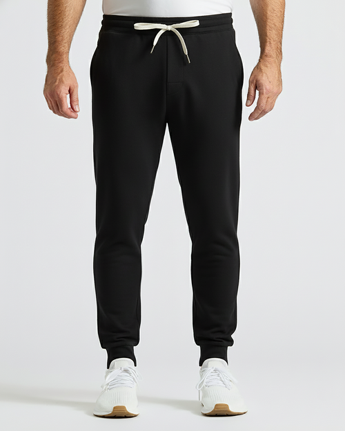 Black Active Joggers with white drawcord and white sneakers.