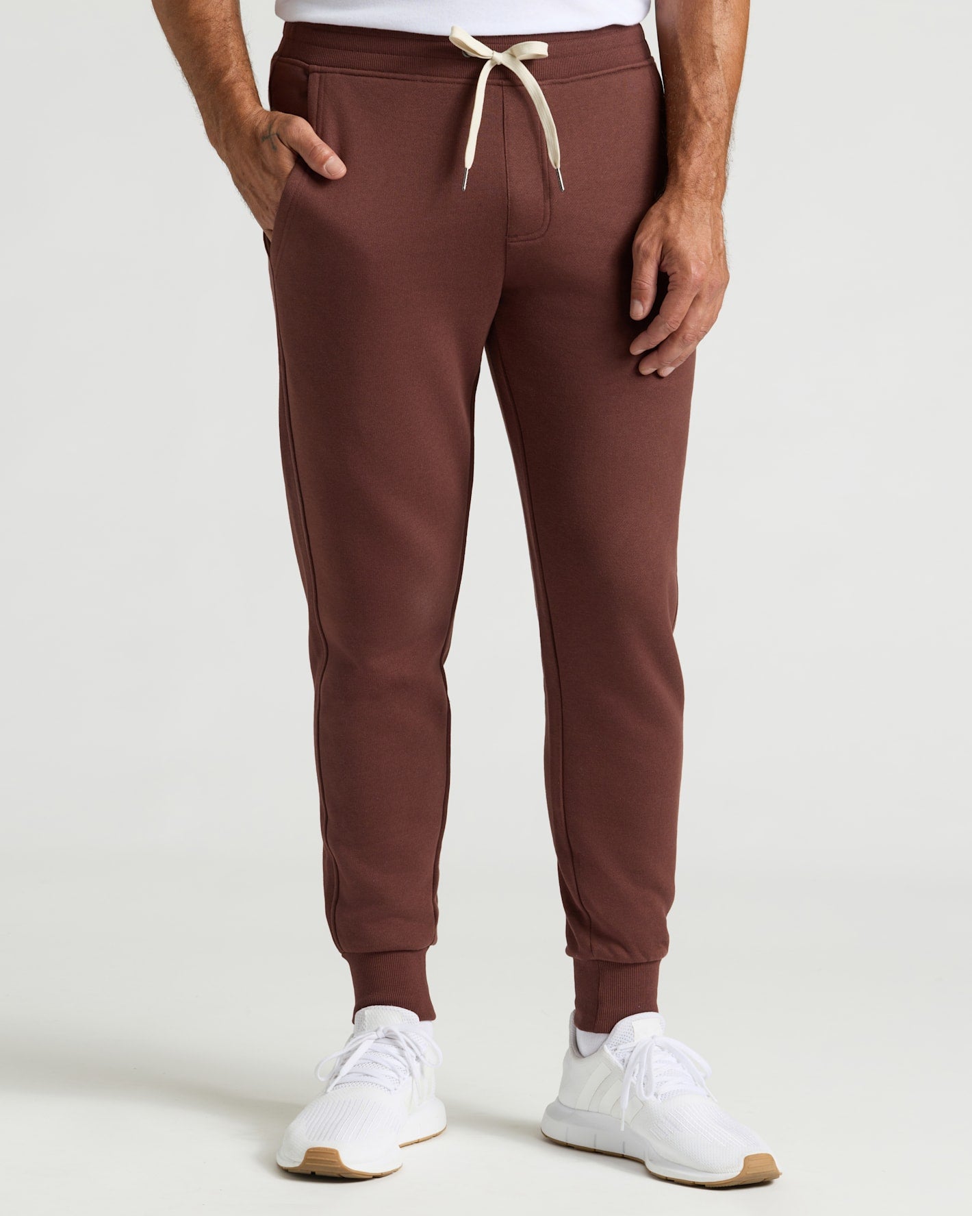 Carob Jogger 2-Pack: chocolate joggers, cuffed ankles, white sneakers.