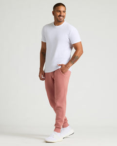True ClassicMan wearing Rose Fleece French Terry Joggers with sneakers.