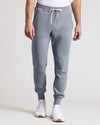 Dusty Blue Joggers with drawstring waist and ribbed cuffs.