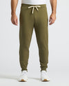 Military Green Fleece French Terry Joggers with white sneakers.