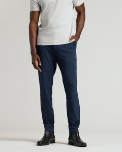 True ClassicMale model wearing Navy Commuter Pants with black Chelsea boots.