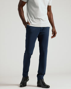 True ClassicNavy Commuter Pants styled with black Chelsea boots.