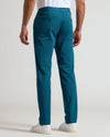Centurion Slim Twill Chino Pant, teal-blue, back view, paired with sneakers.