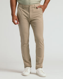 True ClassicCore Slim Chino Pants 3-Pack shown on model with white sneakers.