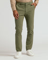 Military Green Slim Chino Pants 2.0 with white sneakers.