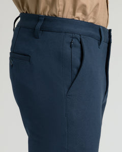 True ClassicNavy Slim Chino Pants 2.0, showing waistband, pocket, and belt loops.