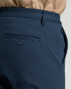 True ClassicNavy Slim Chino Pants 2.0 showcasing welted pocket detail.