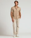 Model in Sandstone Straight Chino Pants 2.0, showcasing relaxed slim fit.