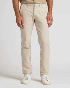 True ClassicSandstone Straight Chino Pants 2.0 with white sneakers.