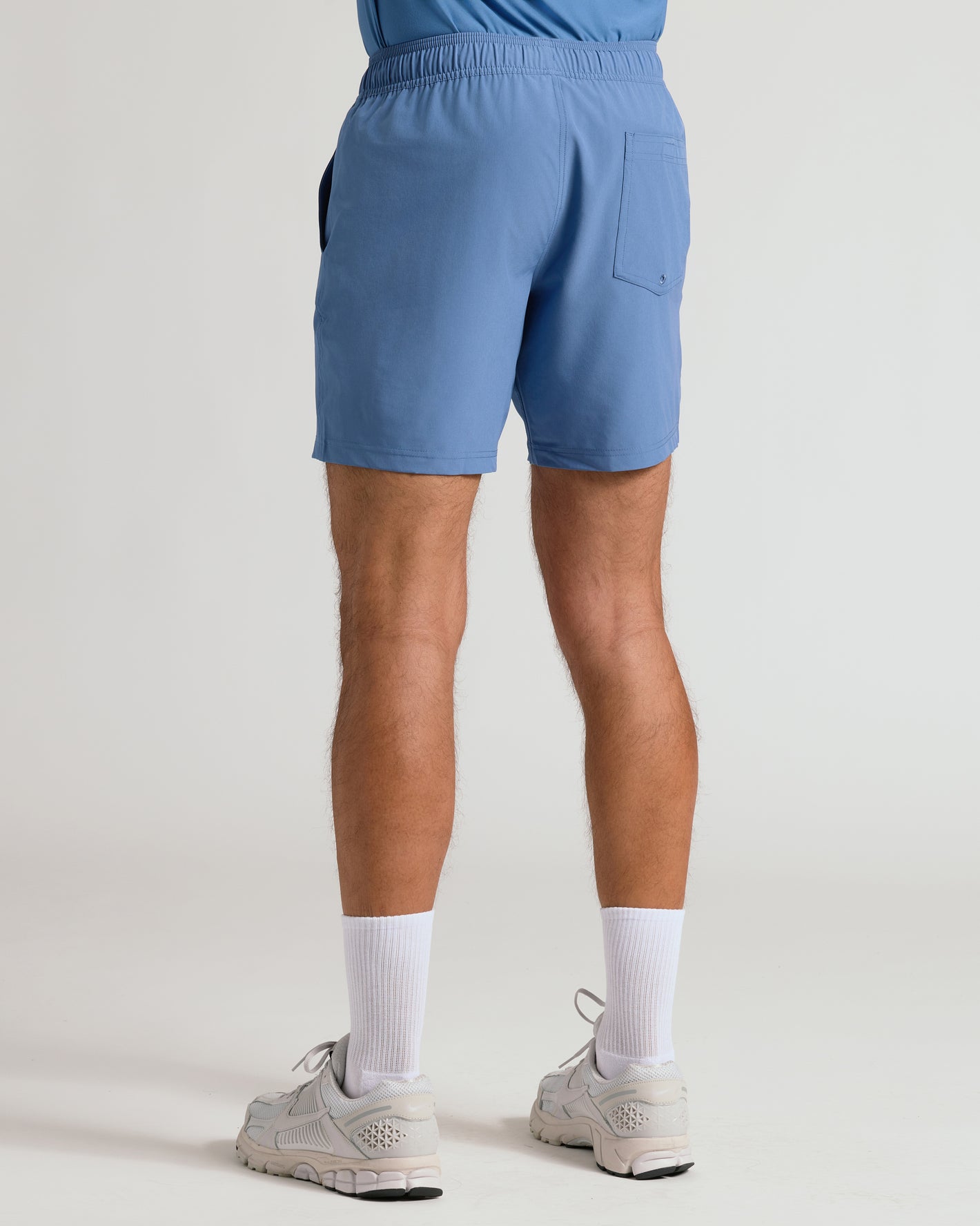 Seasonal Active Quick Dry Short showcased with sneakers and socks.