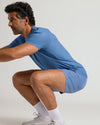 Man squatting in Azul & Juniper Active Quick Dry Short 2-Pack.