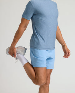 True ClassicPerson stretching in Coast Active Quick Dry Shorts with Liner.