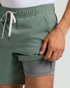 True ClassicPerson wearing Seasonal Active Quick Dry Short, showing sage-green outer and gray liner.