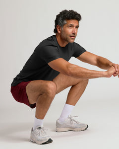 True Classic7 Auburn Active Training Shorts 2.0 showcased during a deep squat.