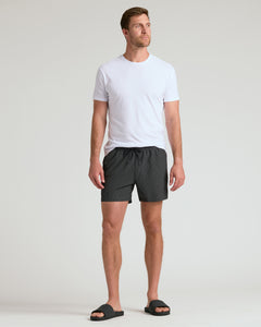 True ClassicMan wearing 5 Smoke Seersucker Swim Trunks with sandals.