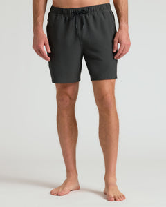 True Classic7 Smoke Seersucker Swim Trunks on model, showcasing mid-thigh length.