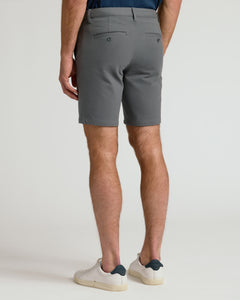 True Classic9 Carbon Chino Shorts 2.0, grey, welted back pockets, worn with sneakers.