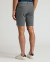 9 Carbon Chino Shorts 2.0, grey, welted back pockets, worn with sneakers.