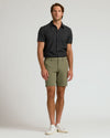 Man wearing 9 Military Green Chino Shorts 2.0 with black shirt.