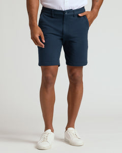 True Classic9 Sandstone & Navy Chino Shorts 2-Pack with white sneakers.