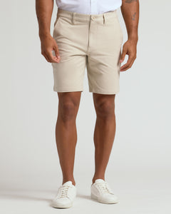 True ClassicPerson wearing 9 Sandstone Chino Shorts with white sneakers.